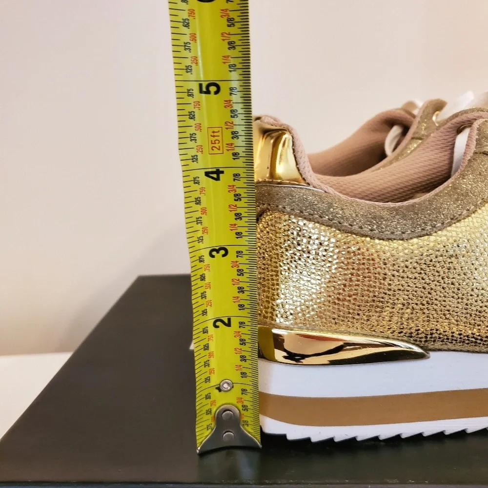 Bebe gold sneakers